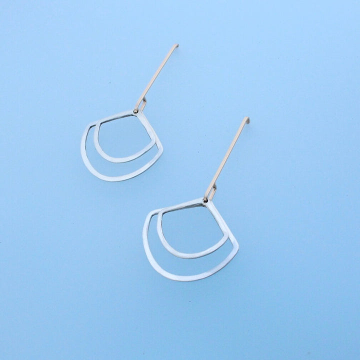 Modern gold ear wires with sterling silver geometric dangles

