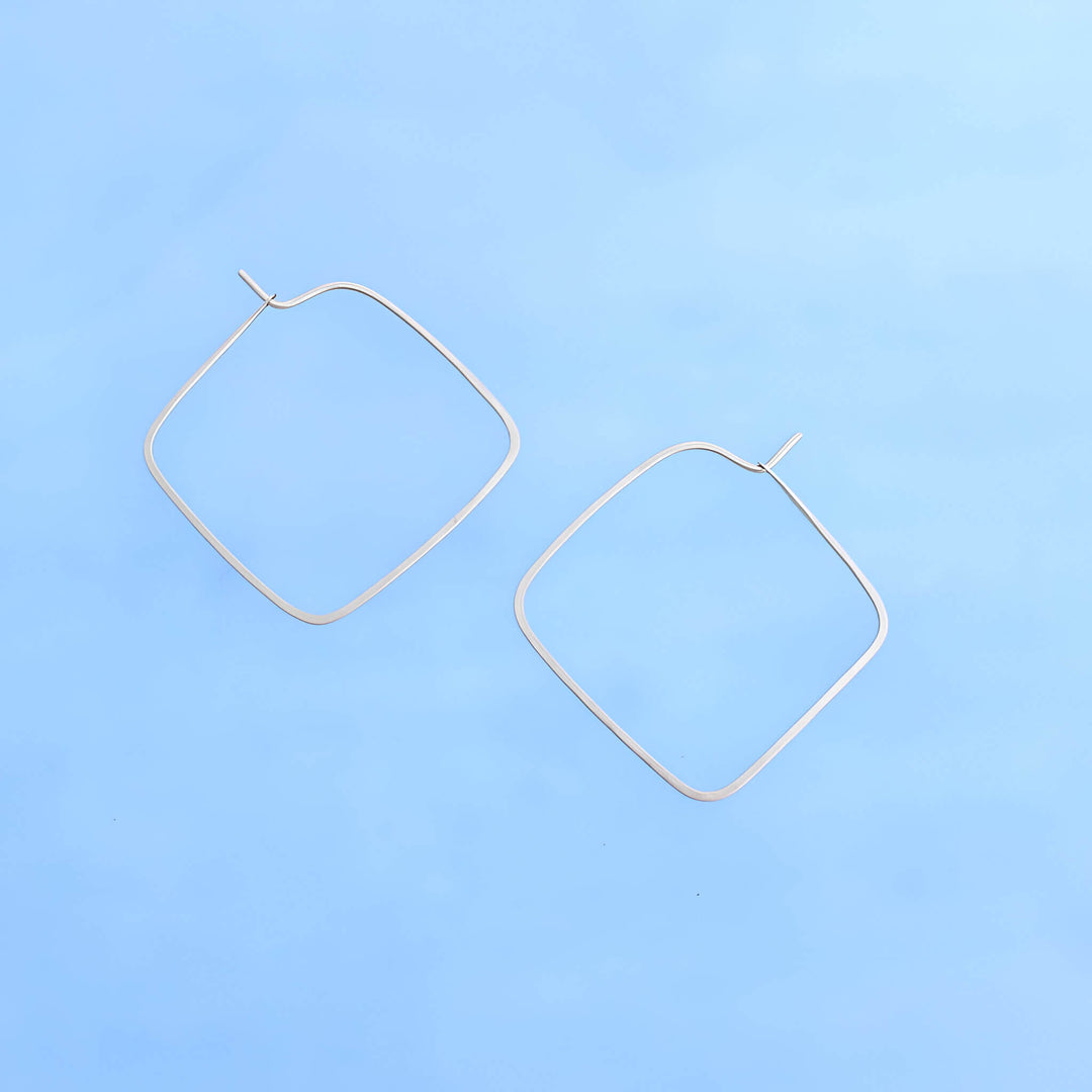 14k gold square hoops with rounded corners. 1 inch diameter