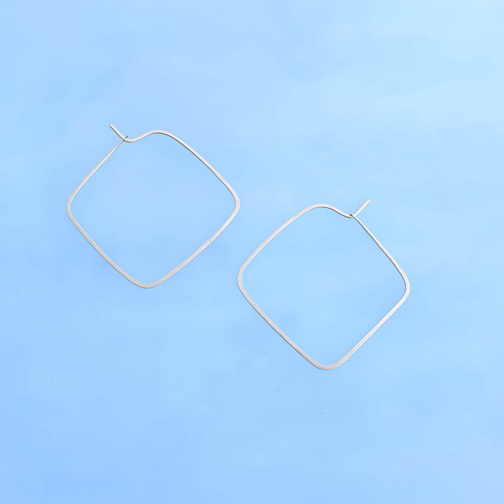 14k gold square hoops with rounded corners. 1 inch diameter