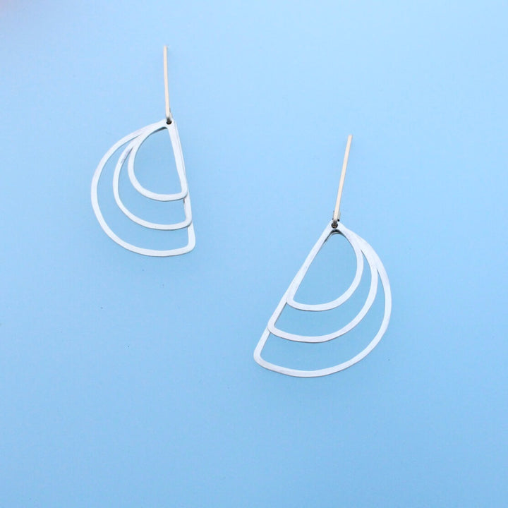 gold and silver dangle earrings with modern gold 1 inch ear wires and three silver semicircles