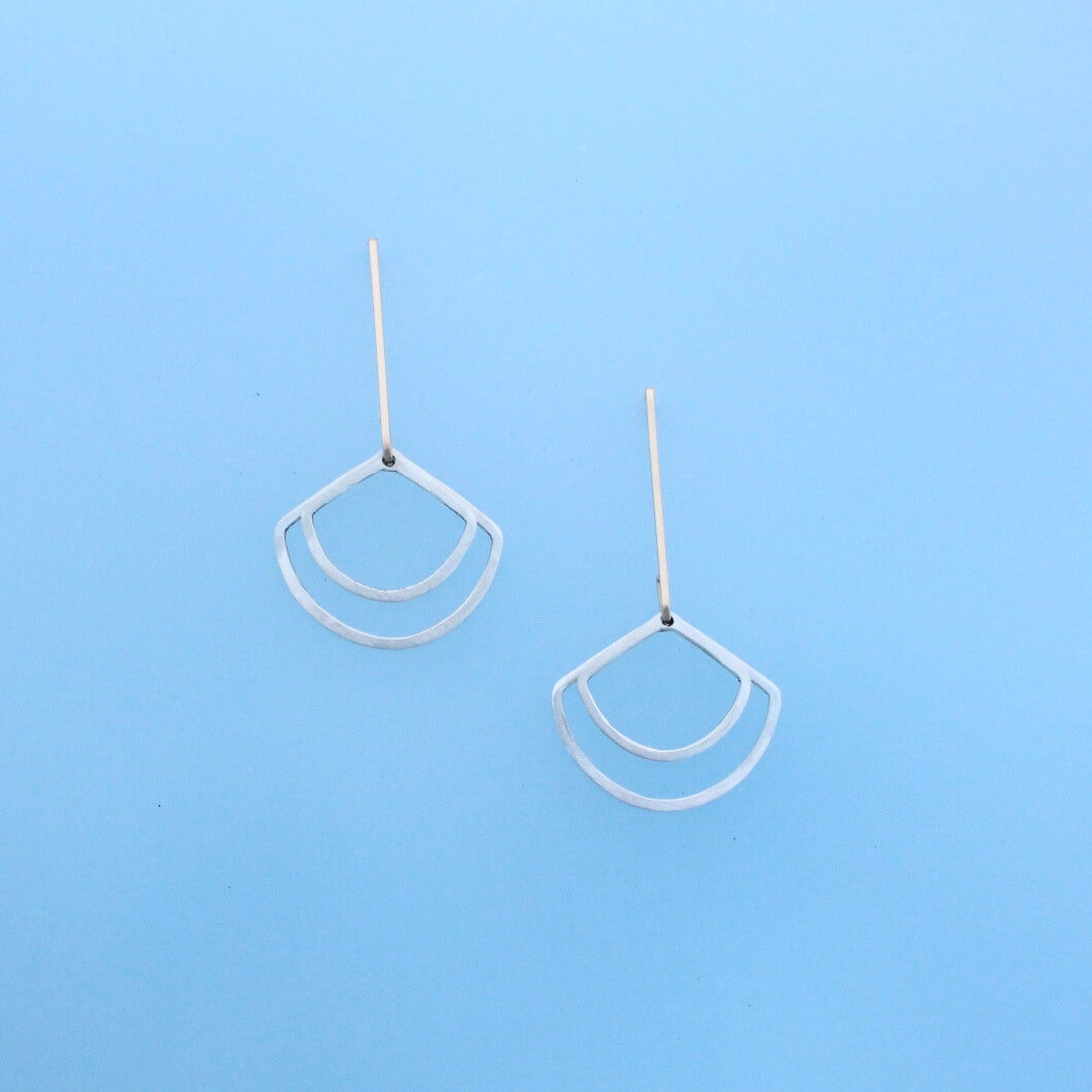 Modern 14k gold ear wires with two geometric dangles in the shape of fans.