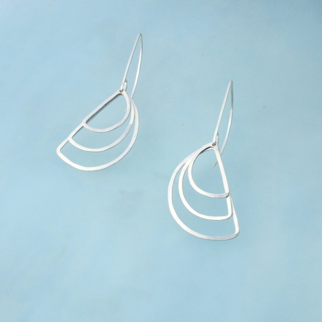 Layered semicircle in three sizes with long modern ear wires
