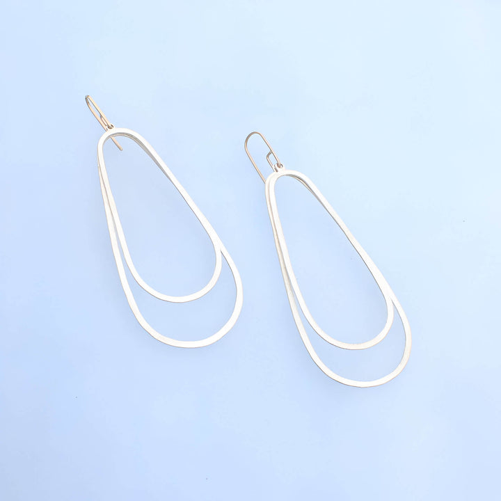 14k gold ear wires with two overlapping silver ovals